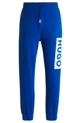 Cotton-terry tracksuit bottoms with logo print