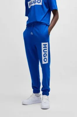 Cotton-terry tracksuit bottoms with logo print