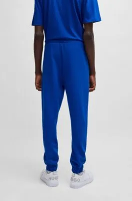 Cotton-terry tracksuit bottoms with logo print