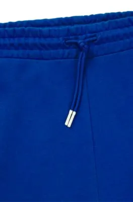 Cotton-terry tracksuit bottoms with logo print