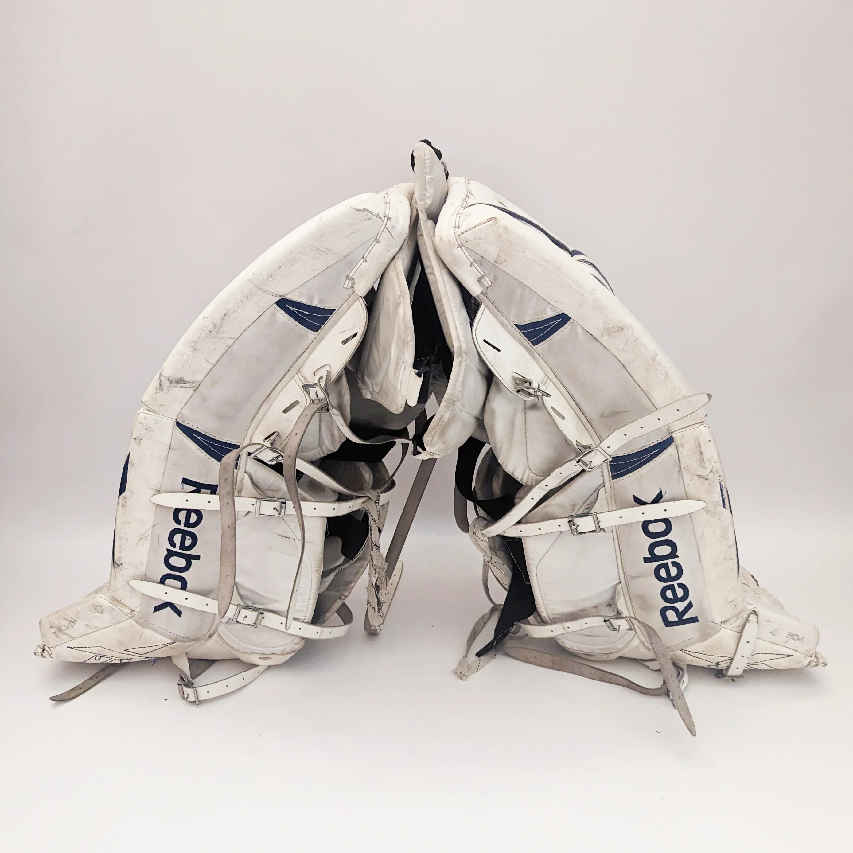 Reebok L9- Used Intermediate Goalie Pads (White/Blue)