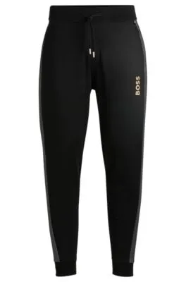 Tracksuit bottoms with foil-print logo