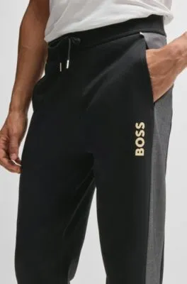 Tracksuit bottoms with foil-print logo